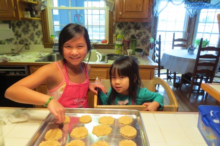 Kasen and Karis making peanut butter cookies
